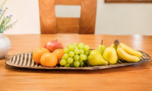 Cargar imagen en el visor de la galería, Hand Carved Jacaranda Wood Bread Board | Rustic Serving Platter (Fire-Cured)
